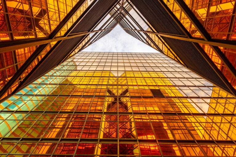 Golden tall buildings and glass reflections in Hong Kong Island